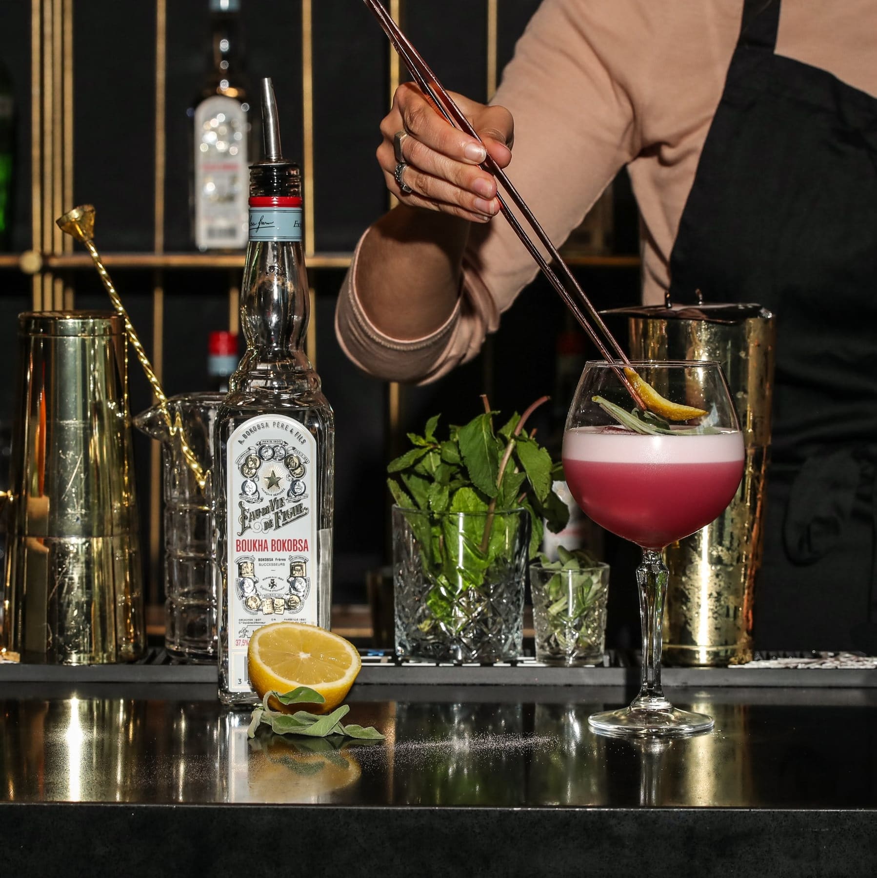 Boukha Bokobsa — bottle and figs