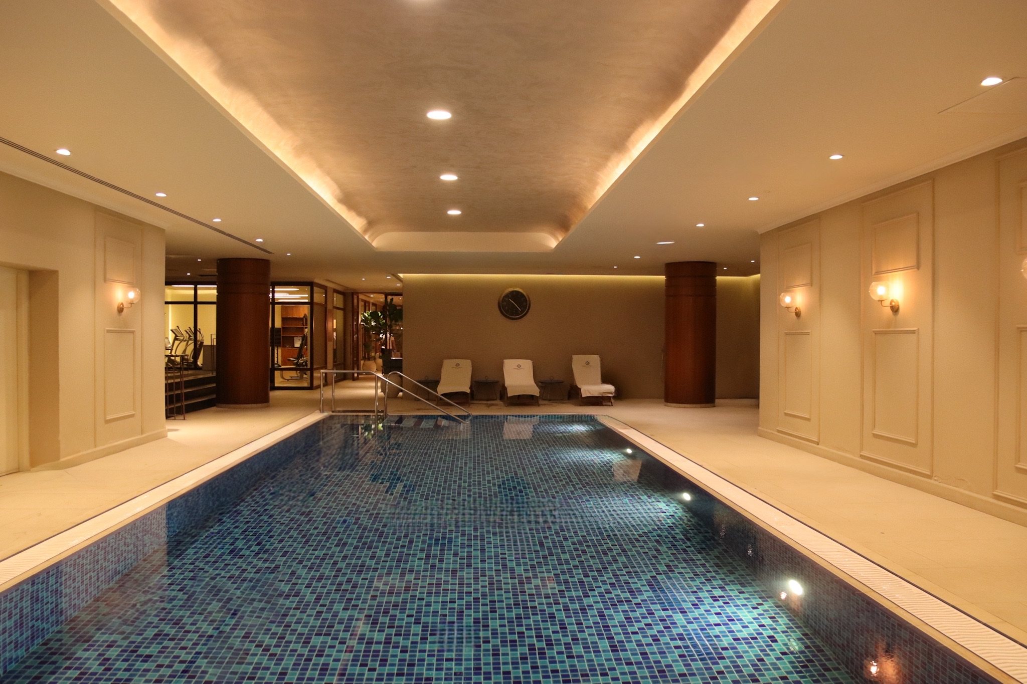 The indoor pool under its warm light
