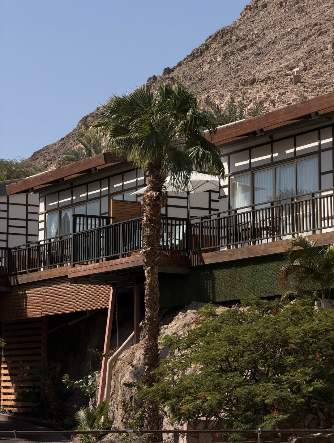 The lodges against the mountain