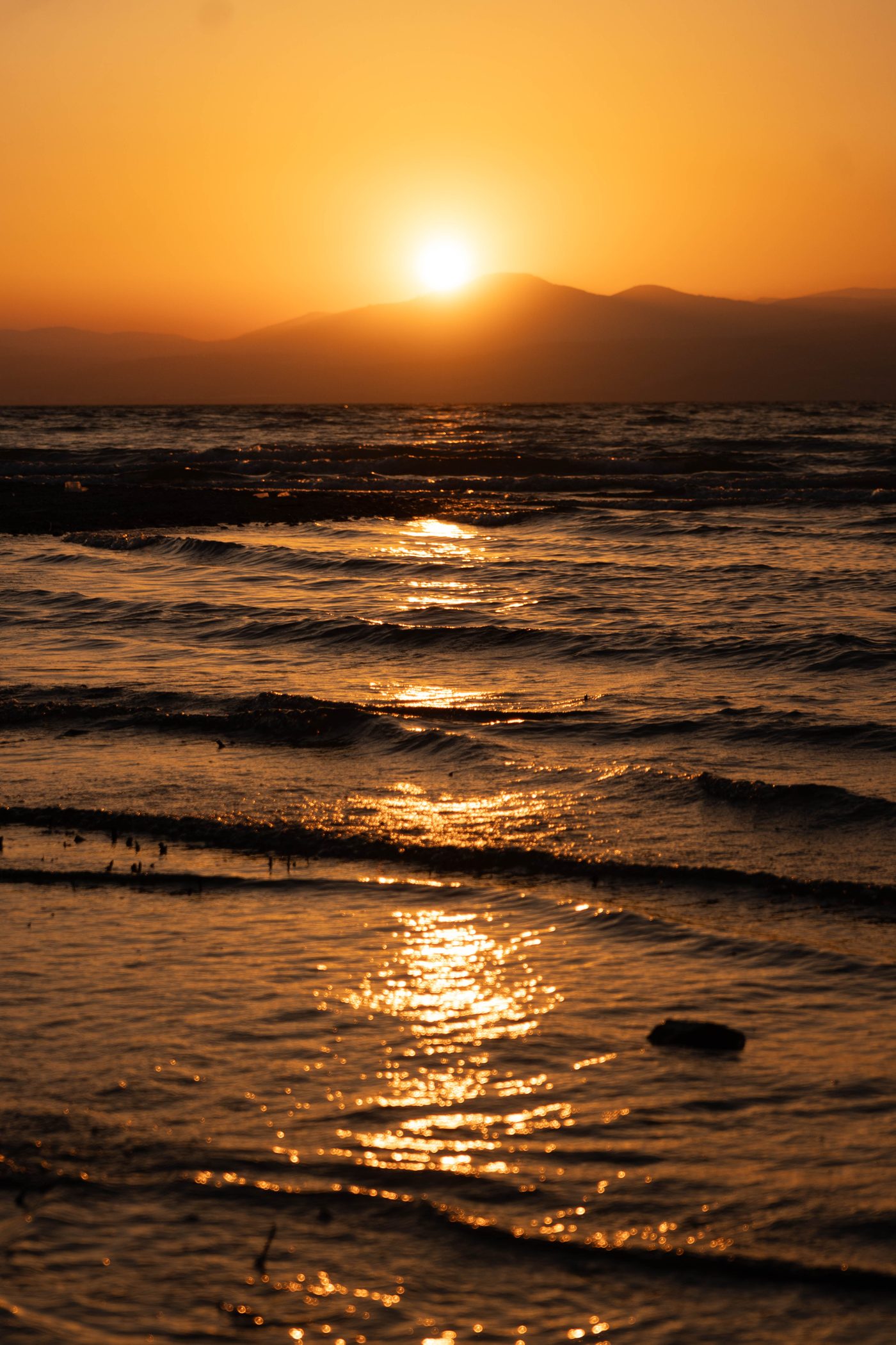 The sun going down over the Sea of Galilee