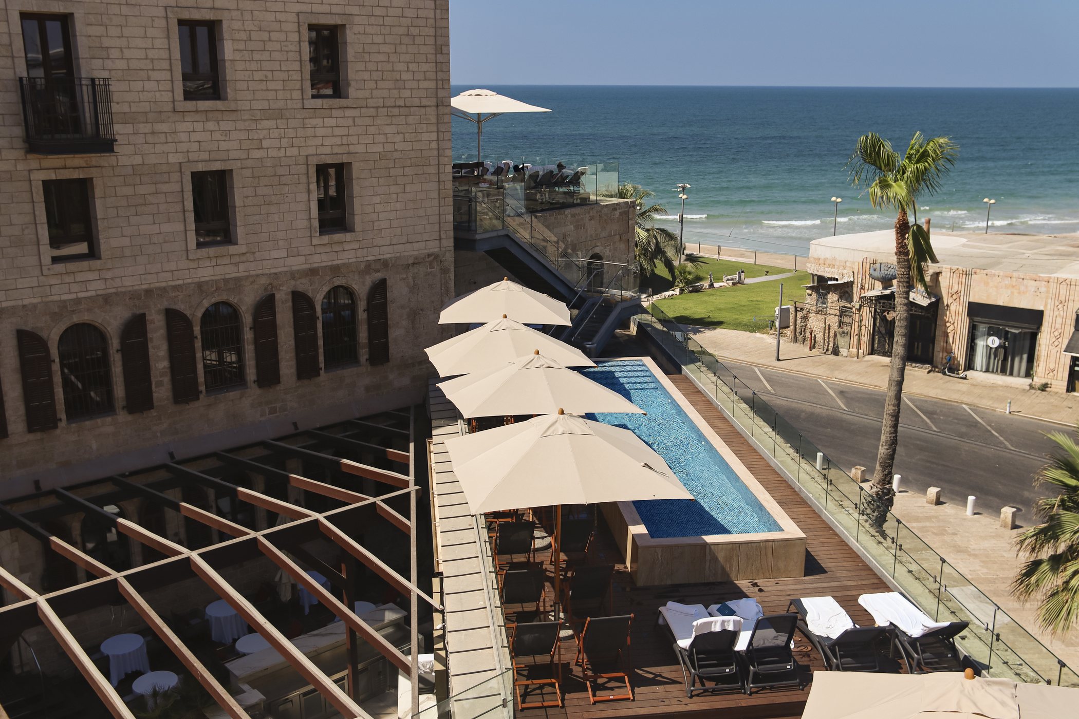 The property from above, the beach and the sea beyond