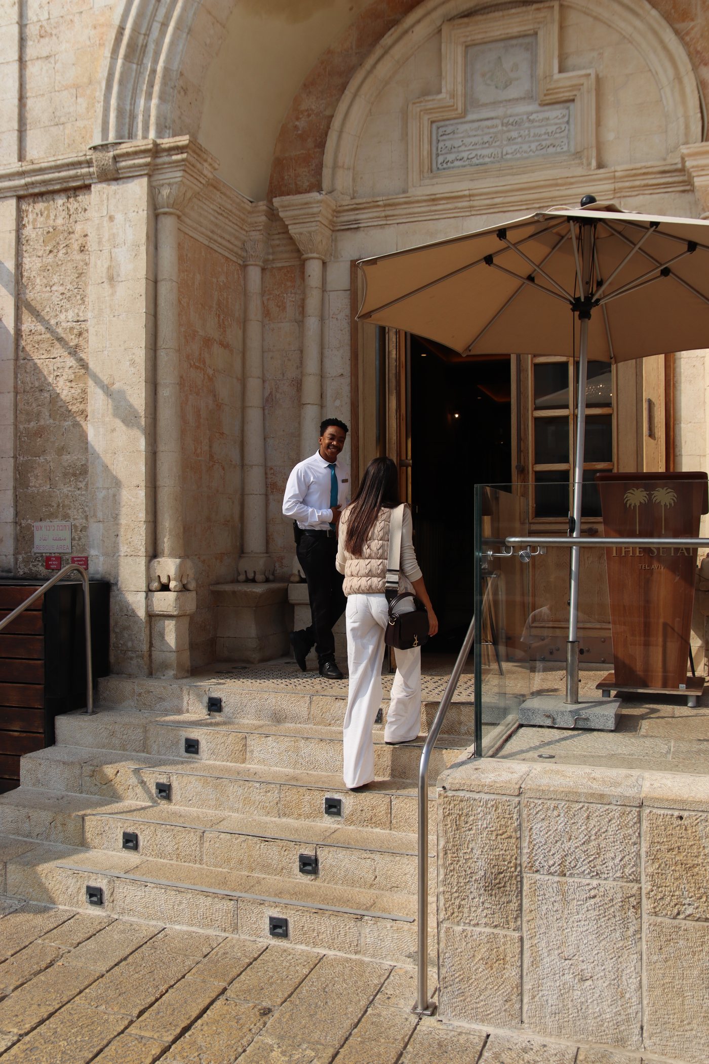 Guests on the steps of the entrance