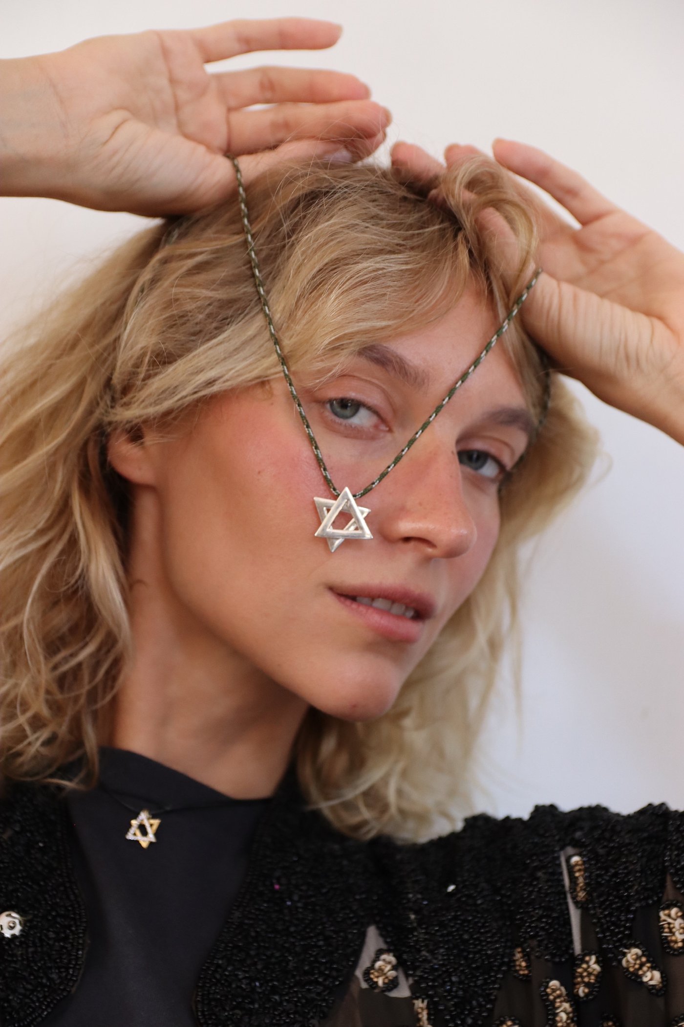 The star held above the head