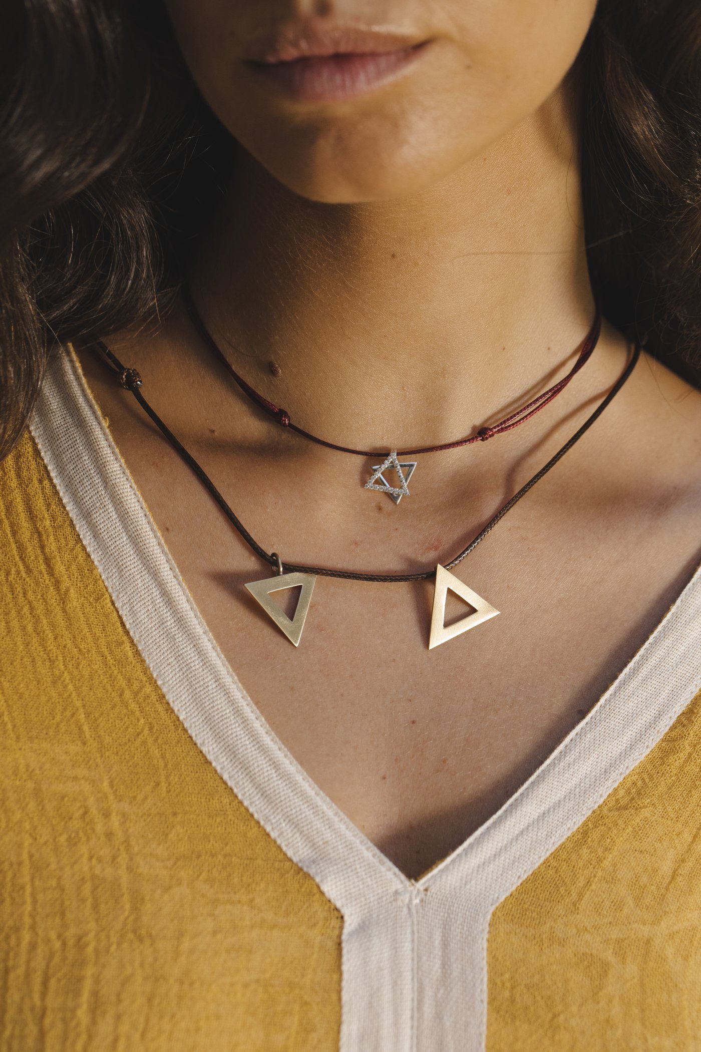Two triangles over yellow
